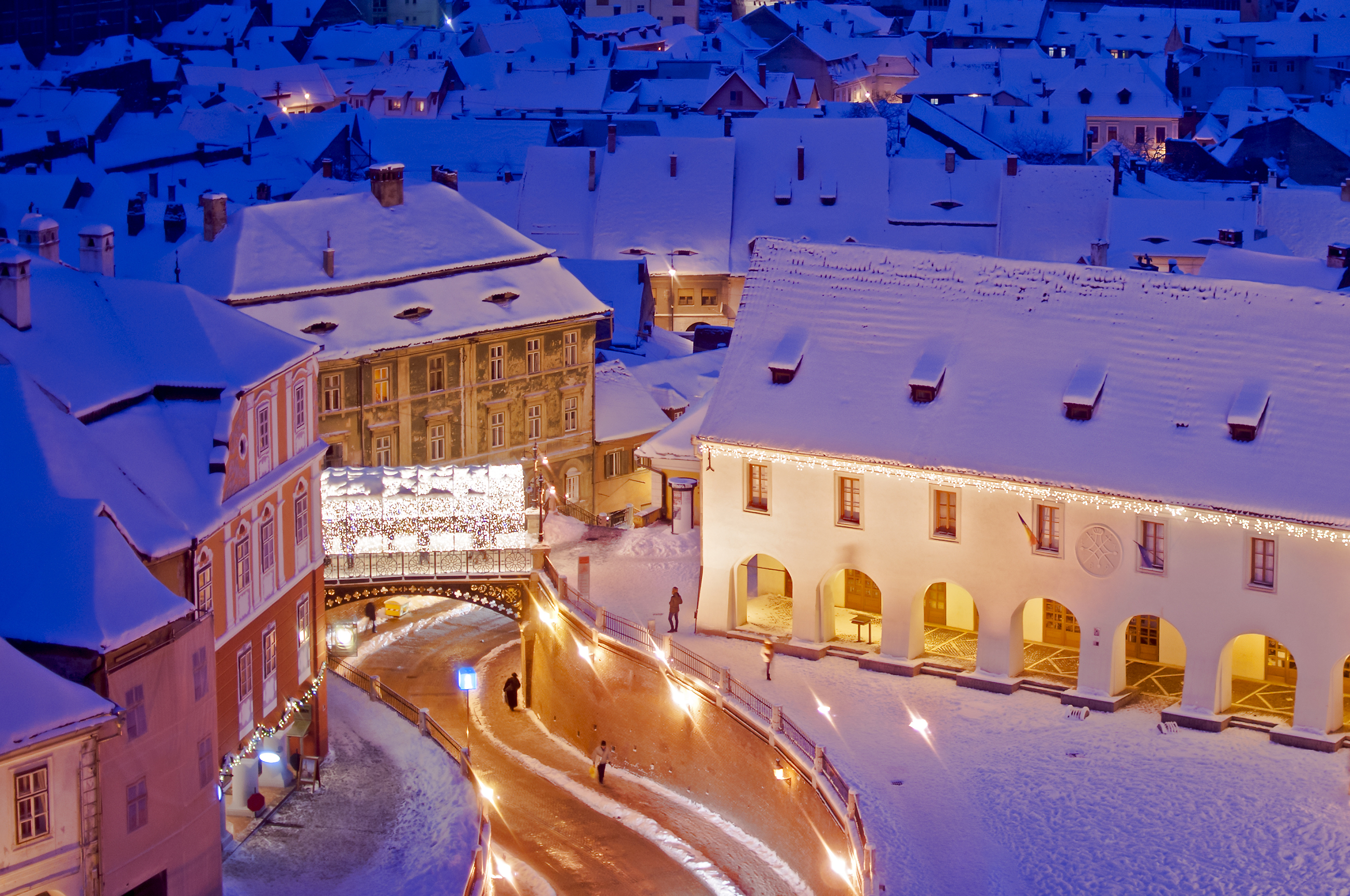 Sibiu, Romania, old town landmark (Liars bridge) in winter with Christmas lights decoration